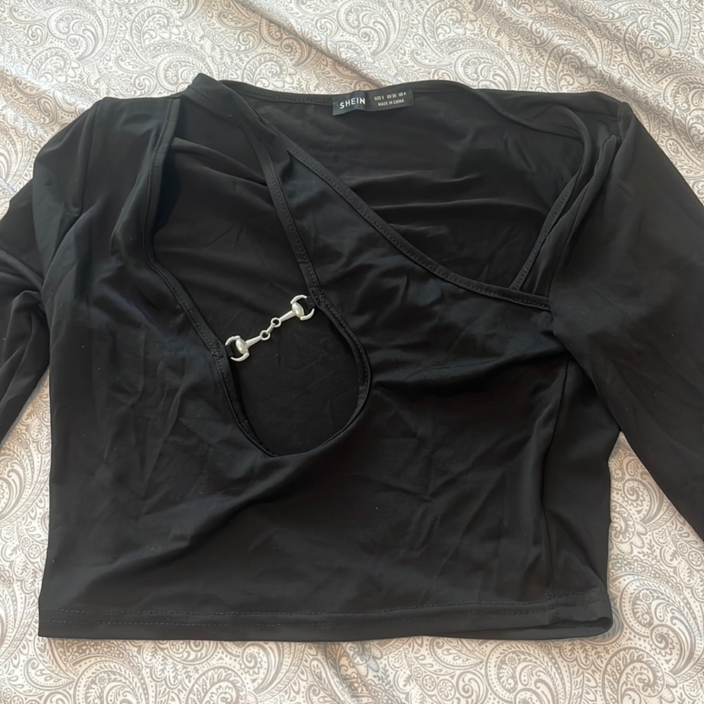 Black long sleeve cut outs going out top